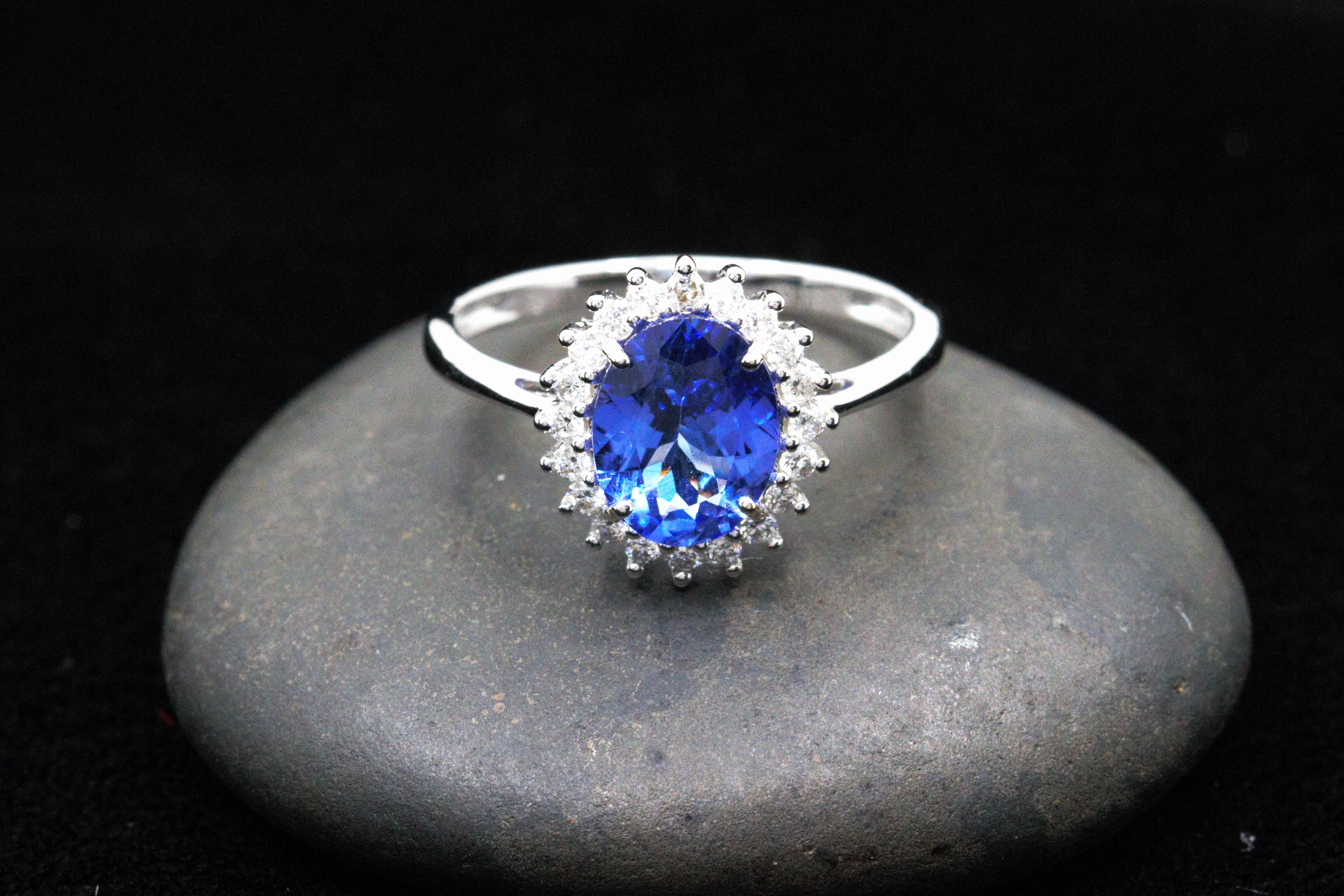 Halo on sale tanzanite ring